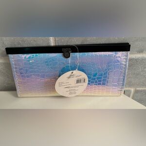 Silver metallic irradiance wallet with several slots for bills, etc.